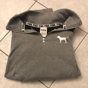 pink half zip hoodie.